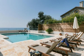 Stone Villa Stunning Views in Nissaki for 12 people